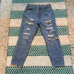 Size 28 Free People distressed button up ankle jeans.